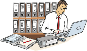 Ein Mann arbeitet in einem Büro an einem Computer
